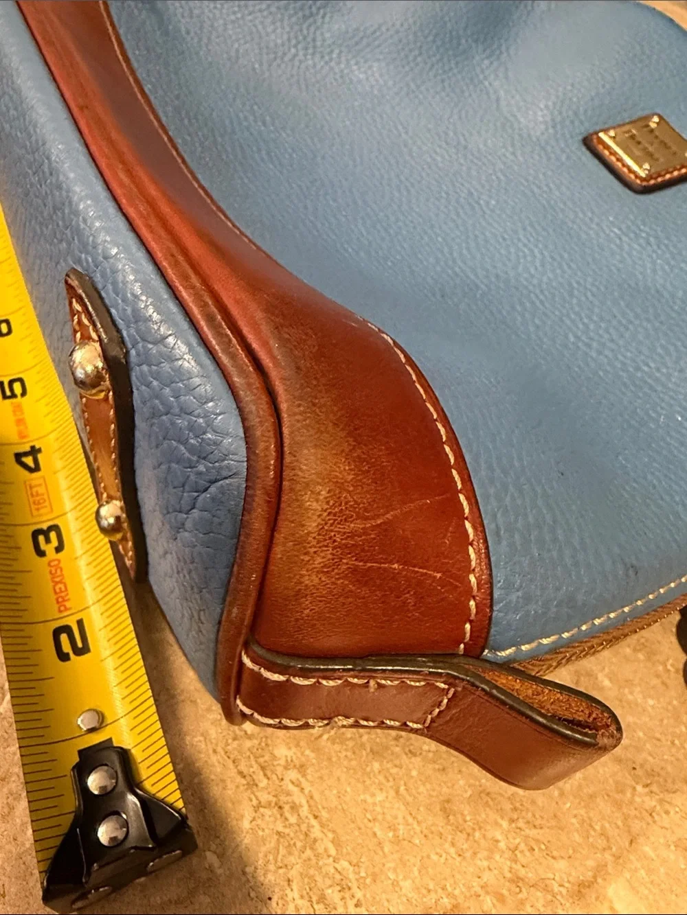 Dooney & Bourke Light Blue Leather Backpack with Brown Trim